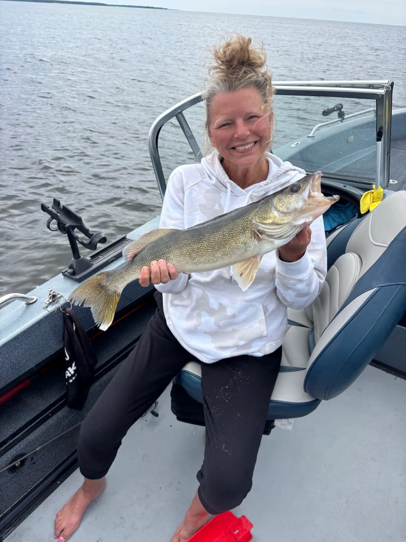 Reel Therapy guest holding her catch
